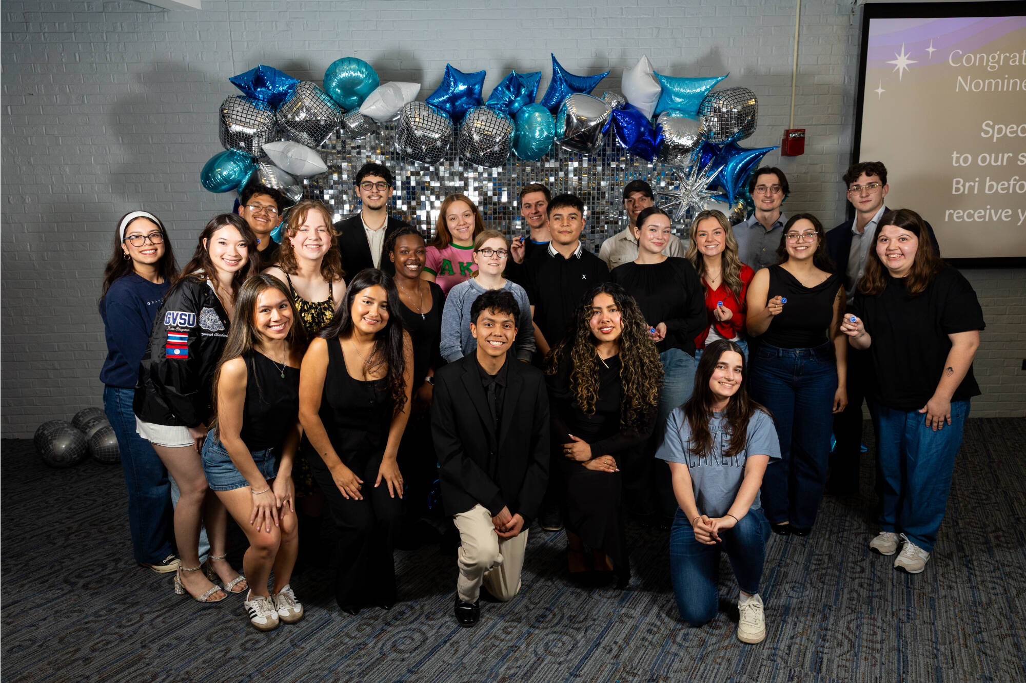 A group of fourth year students posing for a photo